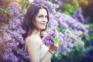 beautiful woman with purple flowers 